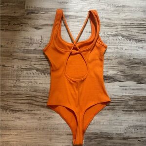 Lulu's Orange Ribbed Strappy Bodysuit
